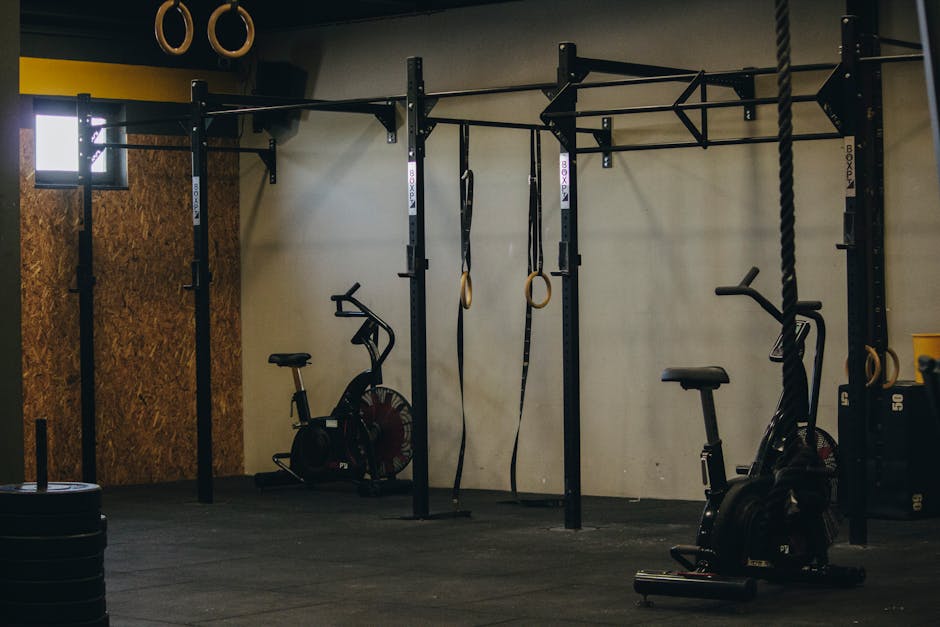 industrial-style-gym-with-exercise-bikes-rings-and-pull-up-b
