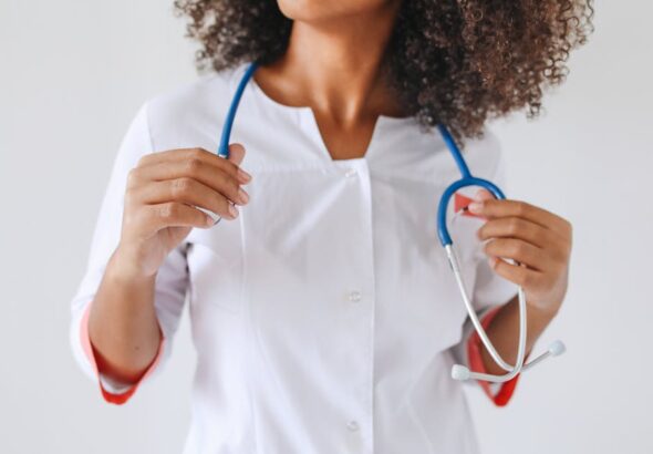 a-female-doctor-holds-a-stethoscope-focusing-on-healthcare-p-1