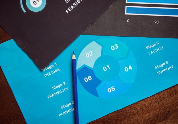 close-up-of-a-business-planning-cycle-chart-with-a-blue-penc